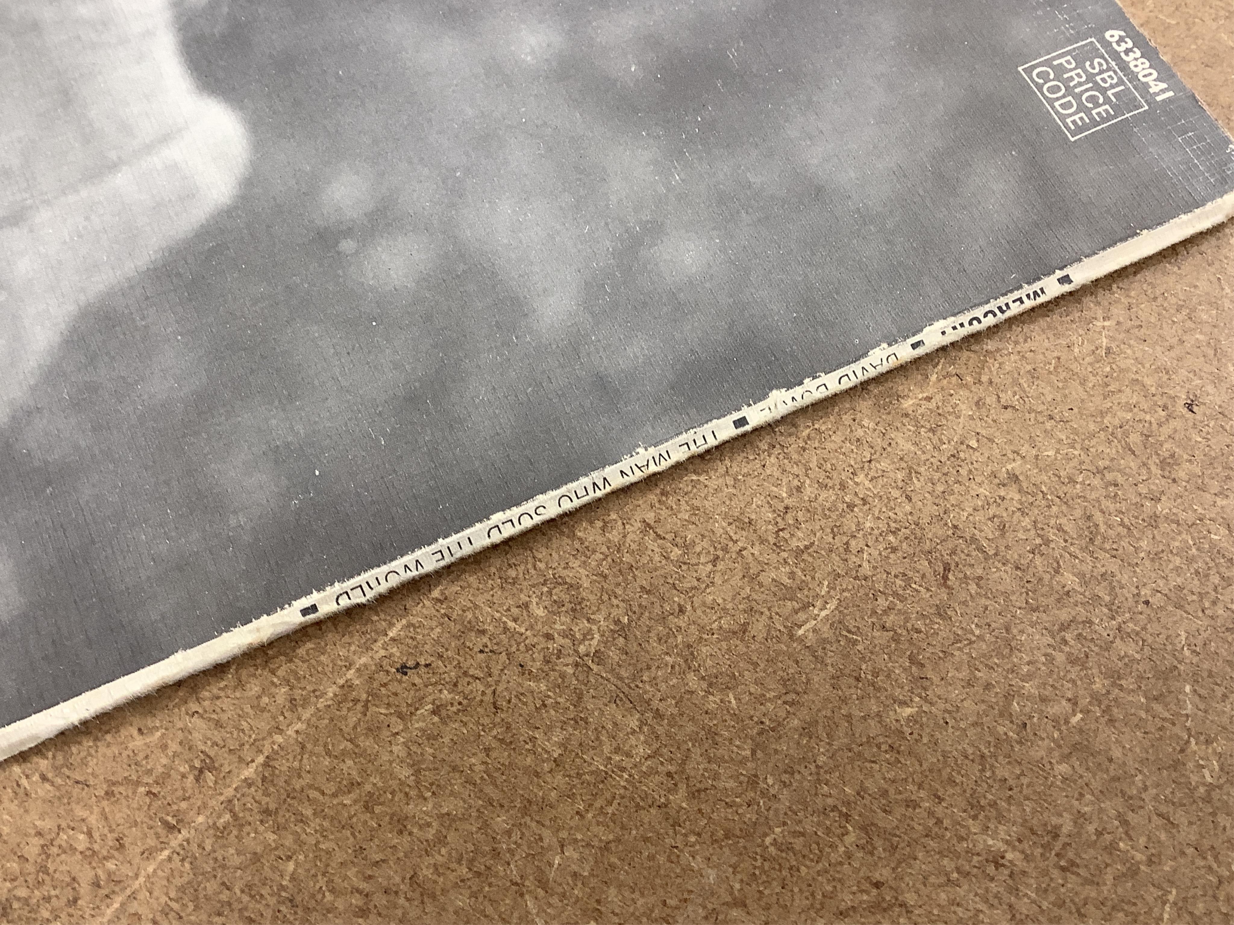 David Bowie, The Man Who Sold the World, 1971 LP record album, on Mercury label, 6338 041, in the scarce cover with Bowie wearing a dress and lying on a chaise lounge